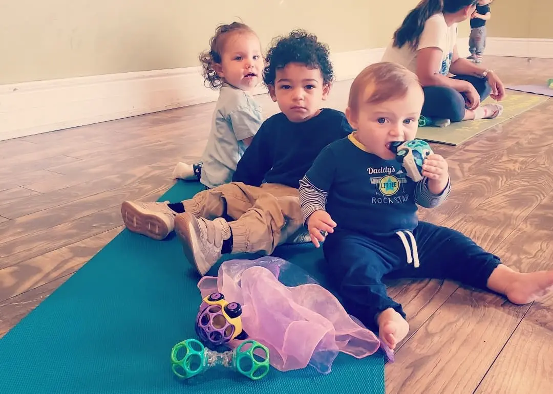 Babies playing in a baby dance class in a Toronto dance studio